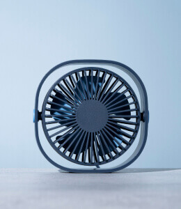 A small modern desk fan